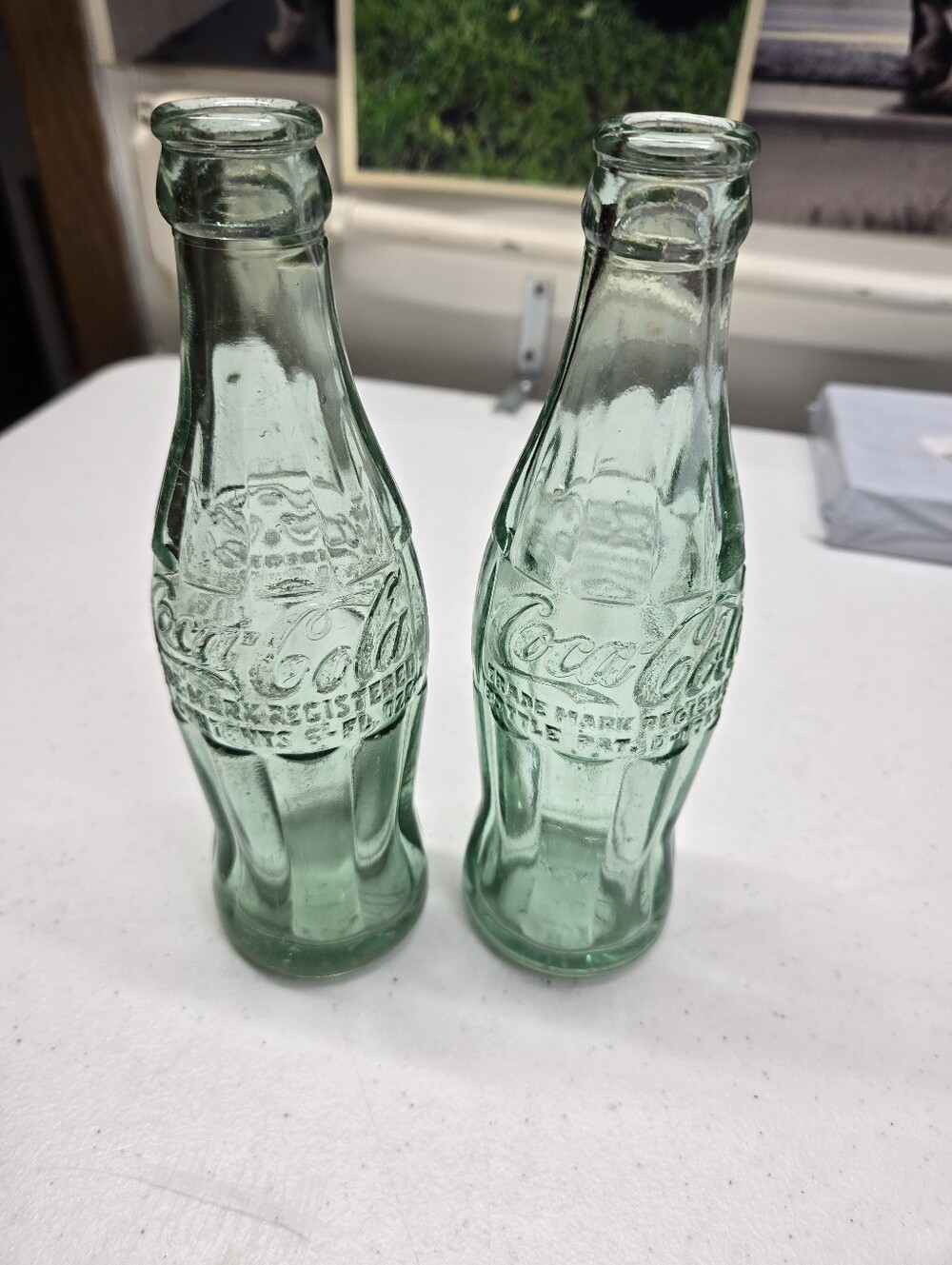 2 Vintage COCA COLA Bottles 6 Oz. Green Glass,Waterloo,IA. & Williston,ND.
